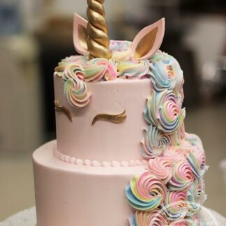 Pink Unicorn WIth Rainbow Cream Floral Tier Cake