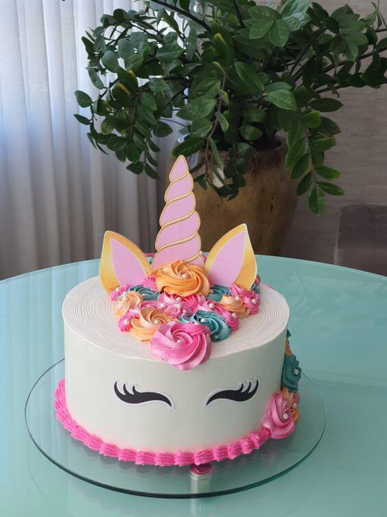 Pink and White Cream Floral Unicorn Cake