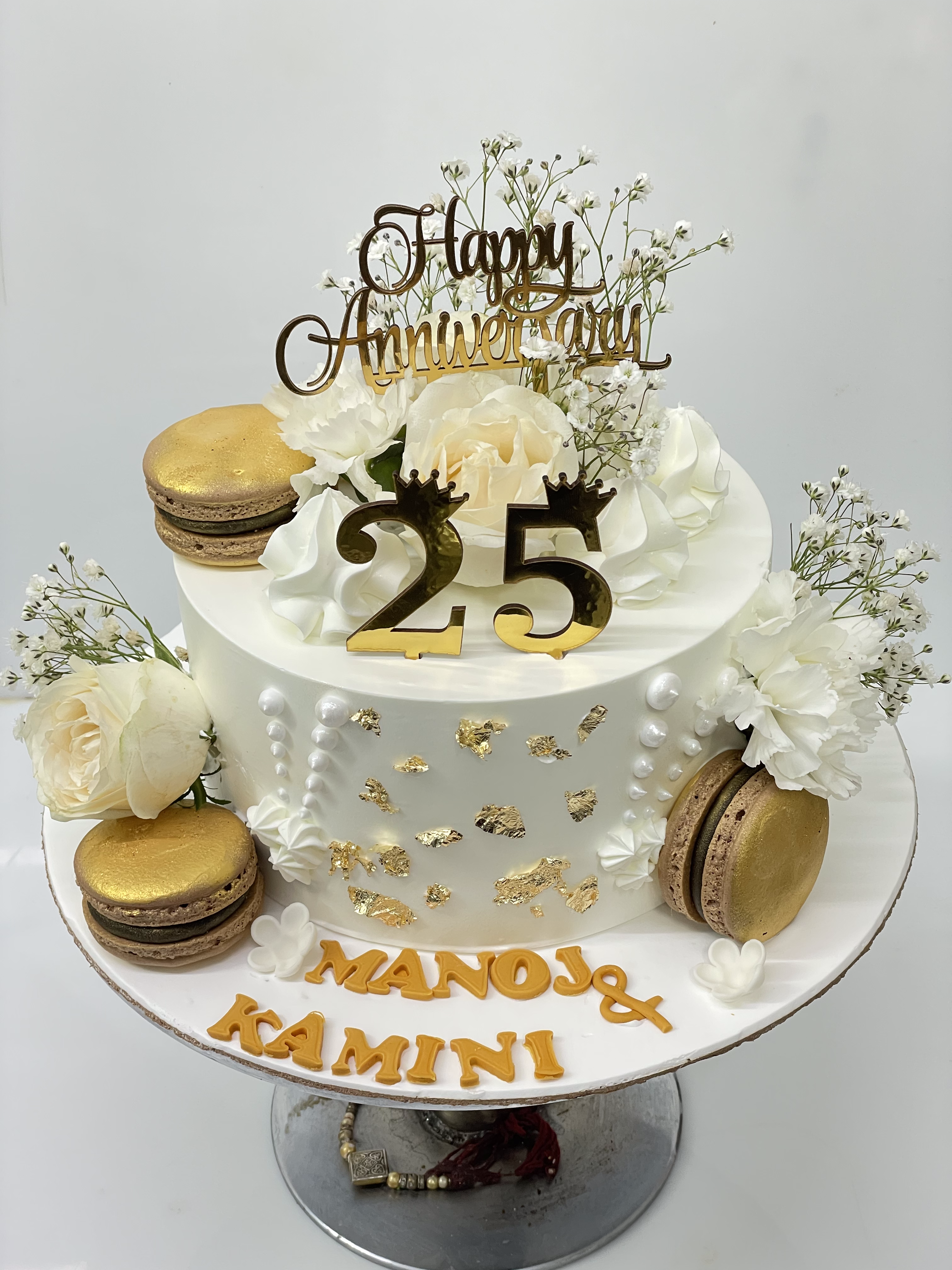 White and Golden Floral Macaron Anniversary Cake